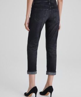 Dark wash rolled-cuff jeans with back pockets, casual denim style, perfect for everyday wear and stylish outfits.