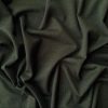 Smooth olive green fabric with soft texture and slight sheen, casually draped with gentle folds, ideal for fashion design, sewing projects, or textile showcasing.