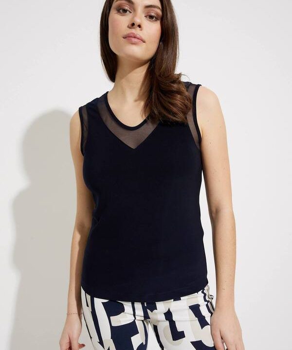 Modern women's sleeveless black top with mesh neckline, stylish and versatile for casual or office wear.