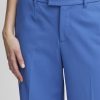 Bright blue tailored high-waisted pants for women, perfect for professional or casual wear, with a sleek fit and belt loops.