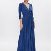 Elegant blue pleated maxi dress with 3/4 sleeves and V-neck, perfect for formal occasions and evening wear. Made from luxurious fabric, designed for a sophisticated and stylish look.