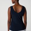 Elegant navy sleeveless top with V-neck, perfect for stylish everyday wear and versatile fashion looks.