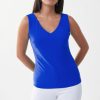 Blue sleeveless V-neck top showcasing stylish fashion and modern design by Katyamaker. Perfect for casual or chic outfits, emphasizing effortless elegance and vibrant color.