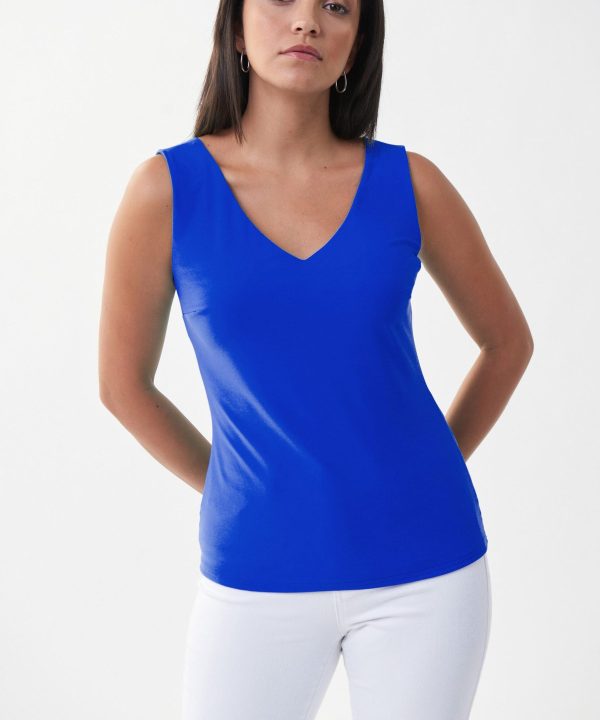 Blue sleeveless V-neck top showcasing stylish fashion and modern design by Katyamaker. Perfect for casual or chic outfits, emphasizing effortless elegance and vibrant color.