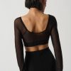 Elegant black sheer long sleeve crop top with scoop neckline, perfect for stylish evening or clubwear outfits.