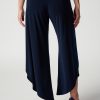 Elegant navy wide-leg satin trousers for women, stylish and comfortable for professional or casual wear, featuring a flattering high waist and flowy silhouette, perfect for sophisticated outfits.