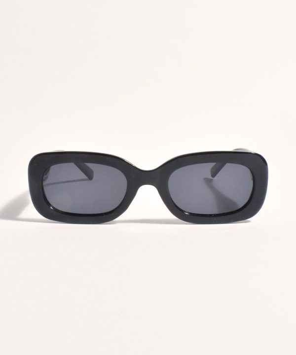 Black fashion sunglasses with dark lenses on a white background.
