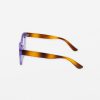 Colorful tortoise shell sunglasses with purple accents, designed for fashion-forward eyewear enthusiasts. Perfect accessory for sunny days and stylish outfits.