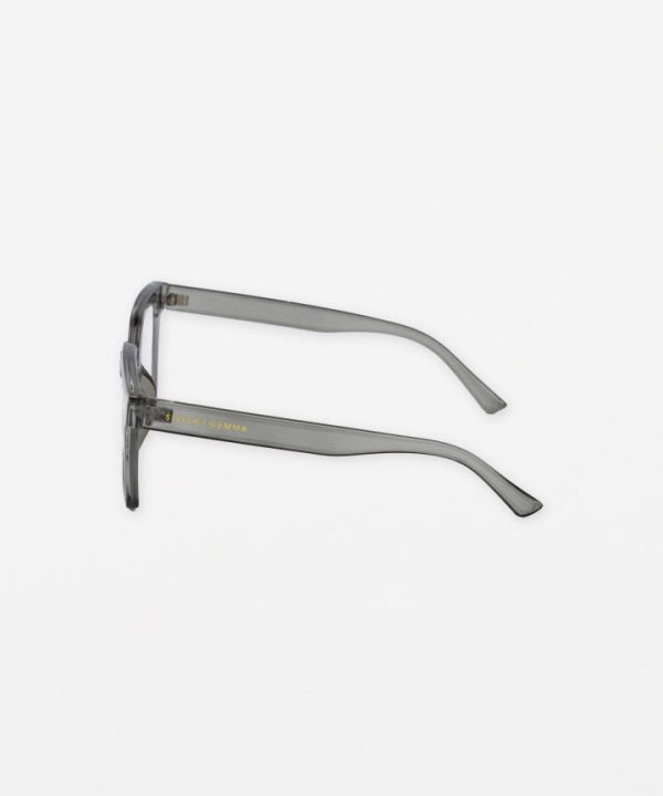 Sunglasses with gray transparent frames and minimalist design, featuring a subtle gold logo on the arm, perfect for stylish accessories and eye protection.