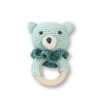 Soft crocheted bear teething toy with wooden ring, handmade baby gift, plush animal rattle for infants, eco-friendly and safe teether for babies.