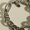 Shiny silver stainless steel jewelry chain with a small 