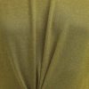 Soft olive green fabric with a smooth, matte texture, featuring elegant pleats and tailored detailing perfect for stylish clothing or home decor projects.