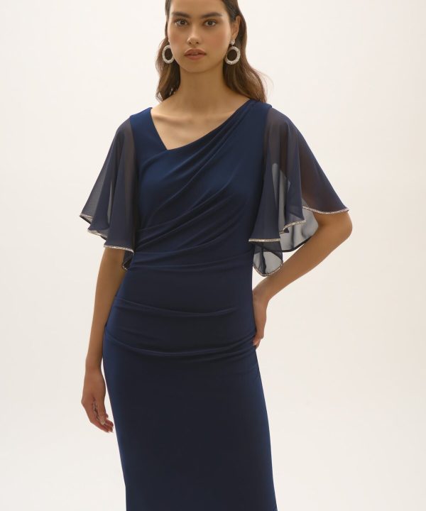 Elegant navy blue dress with ruffled chiffon sleeves, perfect for formal occasions and evening wear. Features a fitted silhouette with draped detailing, showcasing sophisticated fashion and designer craftsmanship.