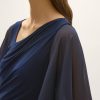Elegant navy blue evening dress with rhinestone trim details on flowing chiffon sleeves and a draped neckline, perfect for formal occasions and special events.
