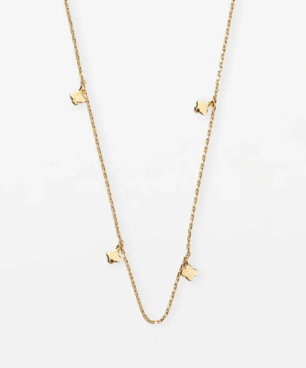 Delicate gold necklace with small clover-shaped charms, perfect for stacking or elegant everyday wear.