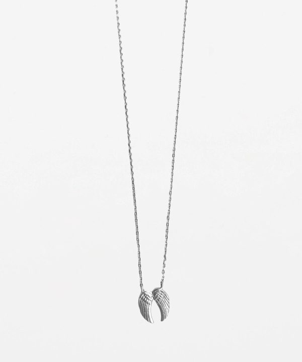 Delicate silver angel wing necklace on a fine chain, perfect for boho or everyday jewelry lovers. Handcrafted jewelry featuring angel wing design, ideal for gift-giving or personal style.
