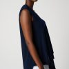 Elegant navy sleeveless top featuring draped fabric detail, perfect for sophisticated style and versatile wardrobe essentials.