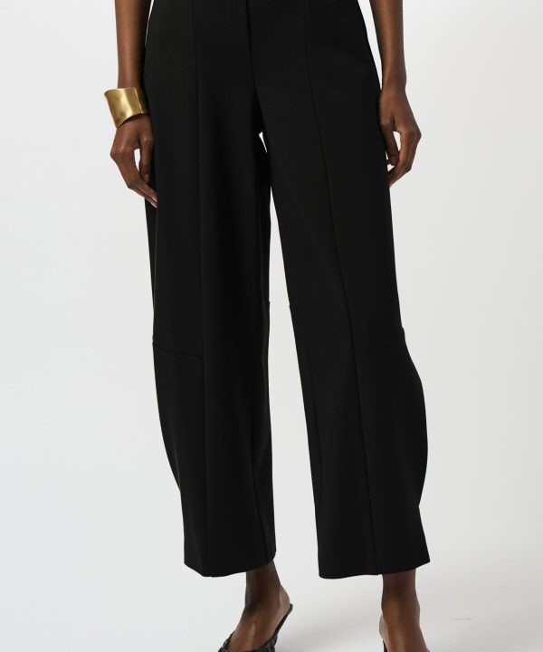 Black wide-leg tailored pants for women with a high waist, perfect for professional and stylish outfits. Designed for comfort and elegance, ideal for workwear or dressy occasions.
