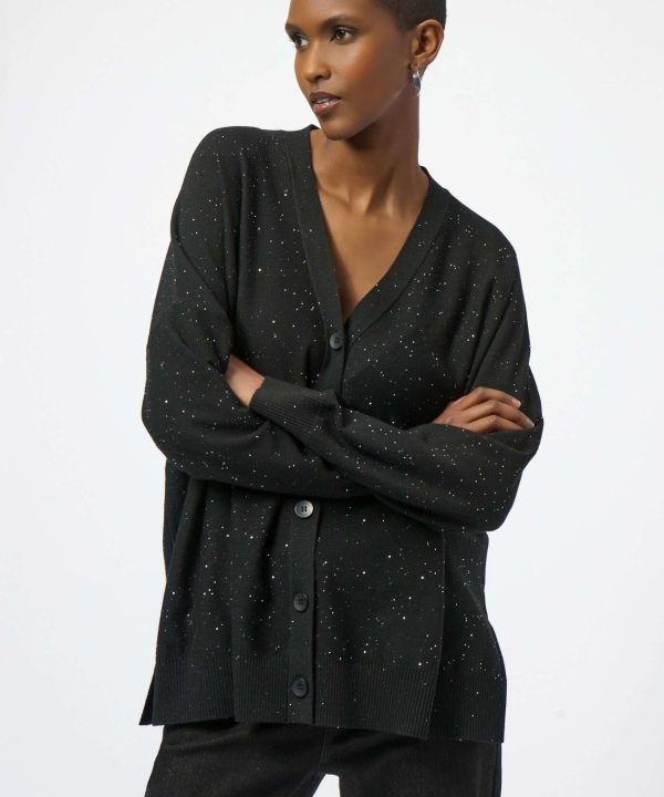 Luxurious black cardigan with subtle glitter accents, perfect for cozy winter fashion and casual elegance.