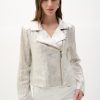 Shiny metallic silver jacket with textured details, modern design, and edgy style, perfect for fashion-forward women seeking statement outerwear.