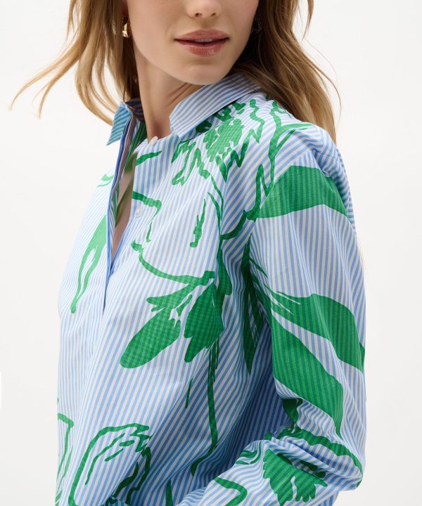 Vibrant green botanical print shirt by Katy A Maker featuring blue and white pinstripes, modern design, and stylish collar. Perfect for contemporary fashion, eco-friendly fabrics, and statement shirts.
